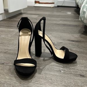 Black high heels.